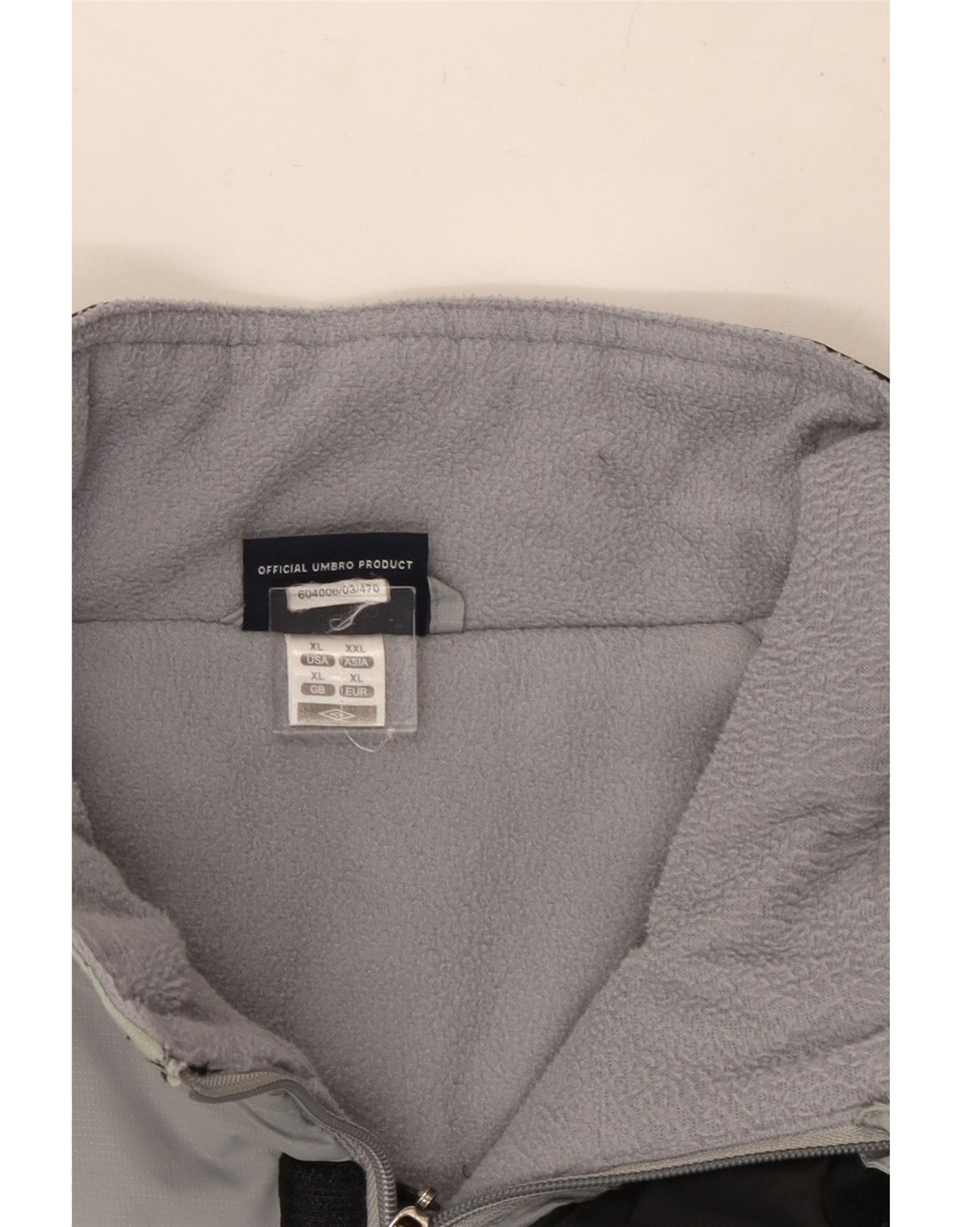 Męska kurtka wiatrówka Umbro UK 42 XL, szary nylon z blokami kolorów