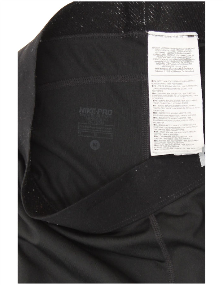 Damskie legginsy Nike Dri Fit Graphic Capri UK 12, średni czarny poliester