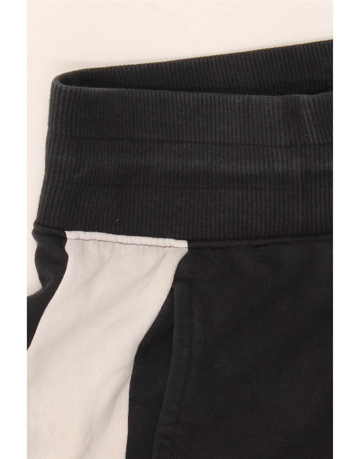 Damskie spodnie dresowe Puma Joggers UK 12 Średni czarny, blok kolorów