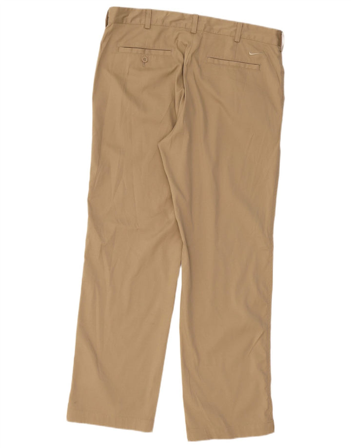 Męskie spodnie typu chino NIKE Dri Fit W34 L30 Beżowy poliester