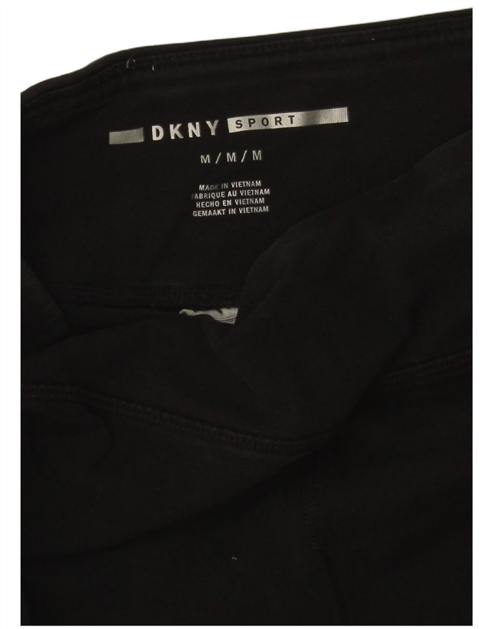 Damskie legginsy graficzne DKNY UK 12, średnie czarne