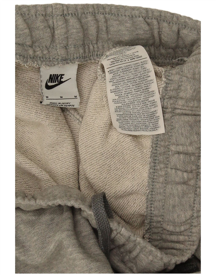Męskie spodnie dresowe Nike Graphic Cargo Joggers, średnioszare, bawełniane