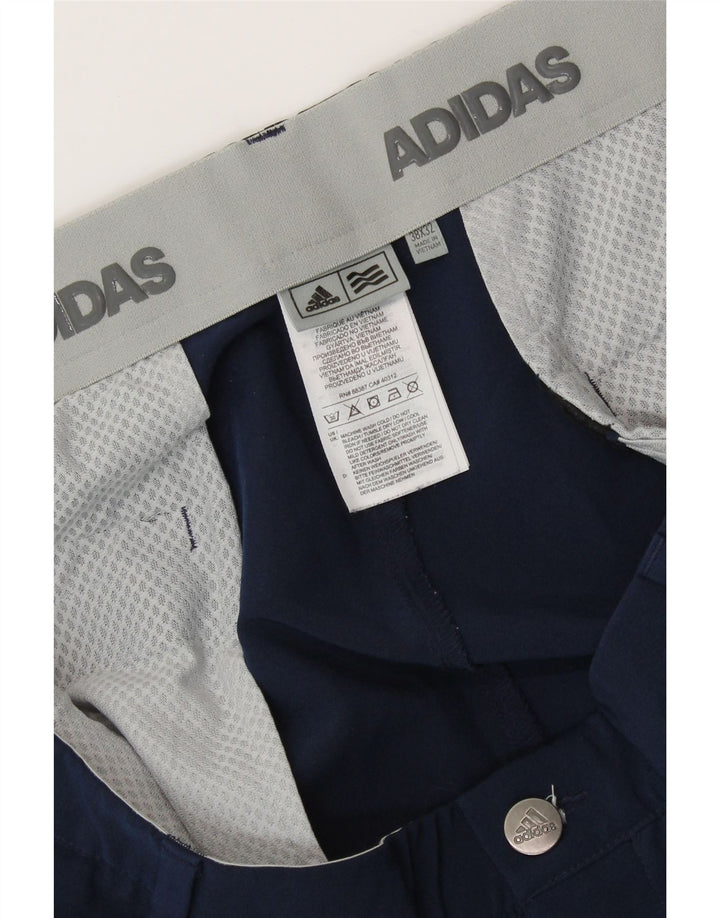 Męskie proste spodnie chino ADIDAS W38 L32 granatowy poliester
