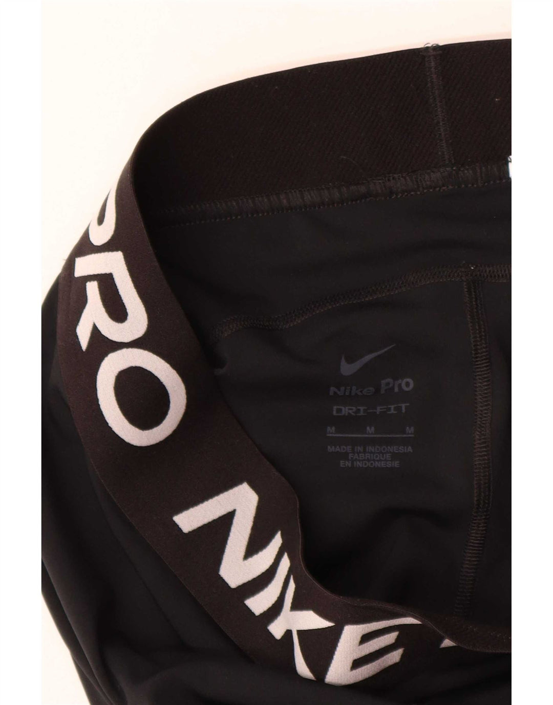 Damskie legginsy Nike Dri Fit Graphic UK 12, średnie czarne
