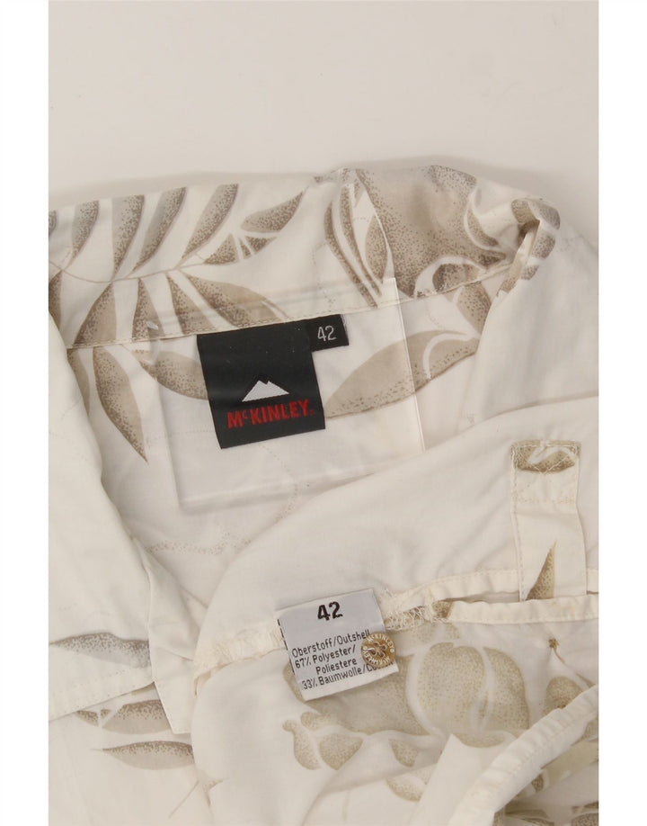 MCKINLEY Womens Short Sleeve Shirt IT 42 Medium Off White Floral Polyester Vintage McKinley and Second-Hand McKinley from Messina Hembry 