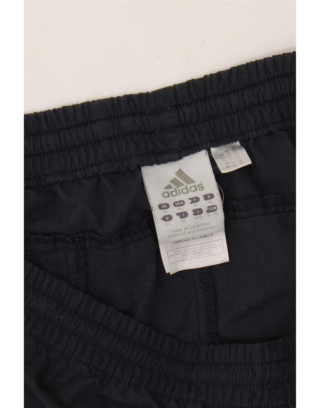 Męskie spodnie dresowe Adidas Capri XL granatowe, poliestrowe