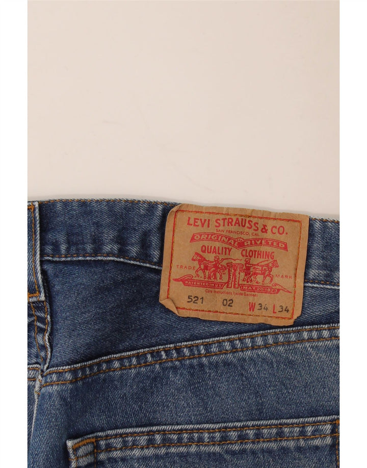 Męskie jeansy Levi's 521 zwężane W34 L28 niebieska bawełna