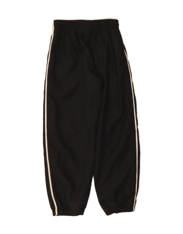 NIKE Boys Tracksuit Trousers Joggers 8-9 Years Small  Black Polyester Vintage Nike and Second-Hand Nike from Messina Hembry 