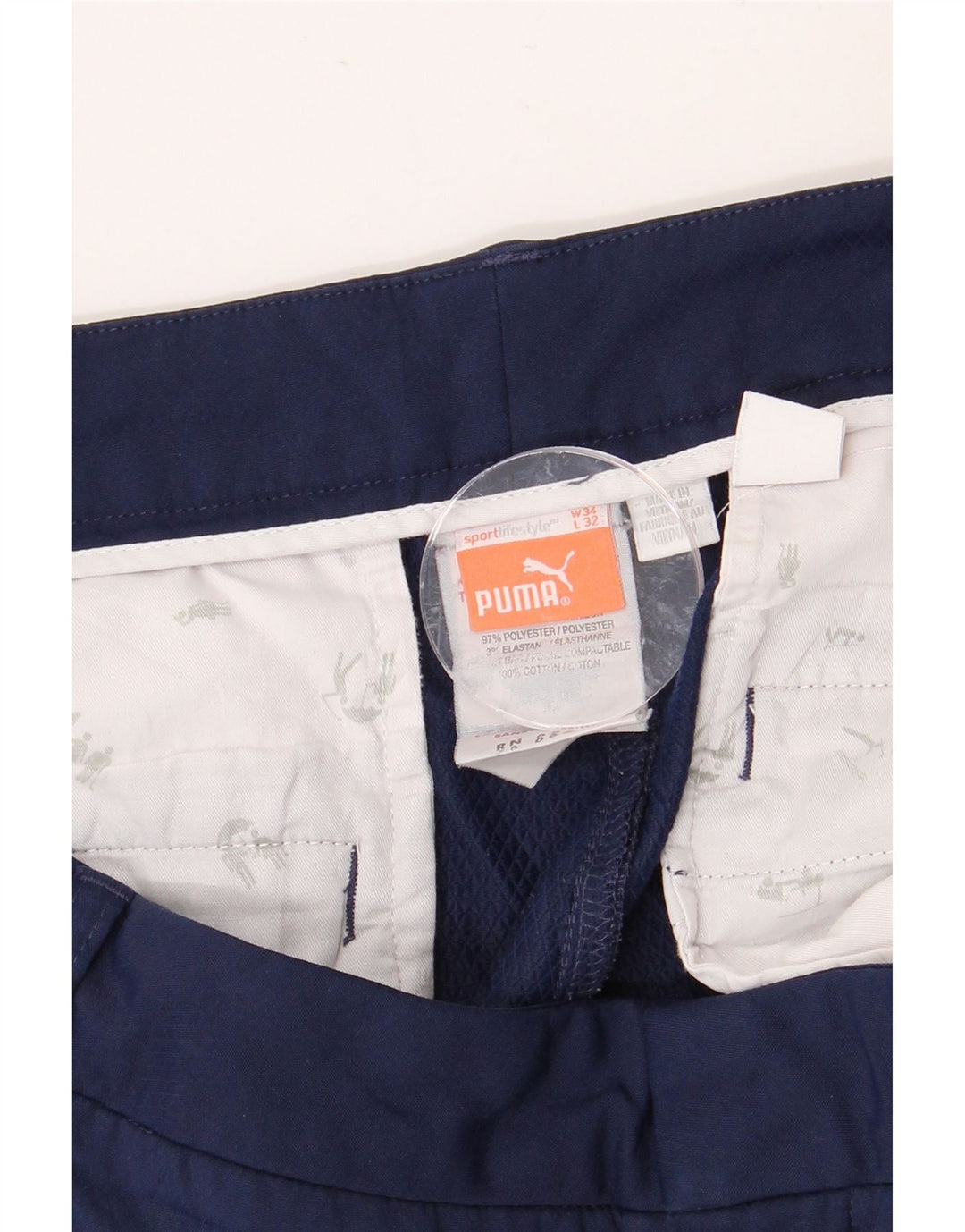 Męskie spodnie typu slim chino PUMA W34 L32 granatowy poliester