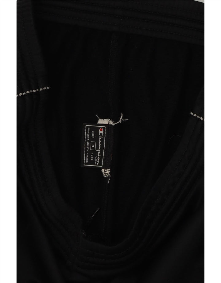 CHAMPION Mens Graphic Tracksuit Trousers Medium Black Polyester Vintage Champion and Second-Hand Champion from Messina Hembry 