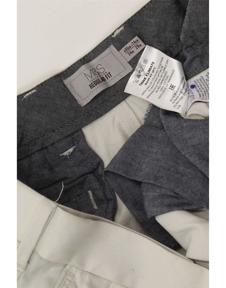 Męskie spodnie chino o regularnym kroju Marks & Spencer W34 L29 Biała bawełna