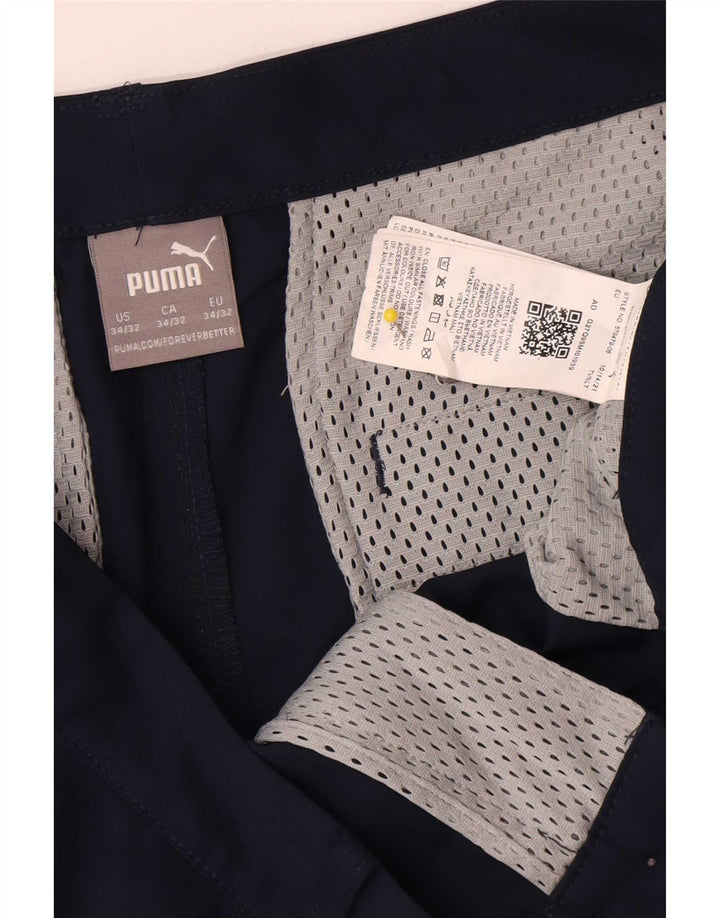 Męskie proste spodnie chino Puma W34 L32 Granatowy poliester
