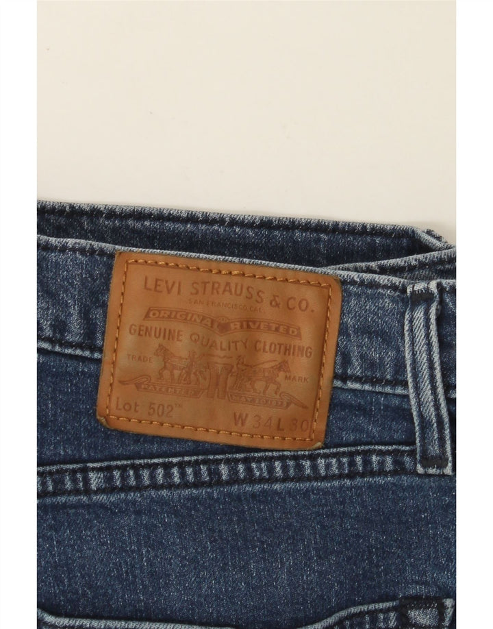Męskie jeansy LEVI'S 502 zwężane W34 L30, niebieska bawełna