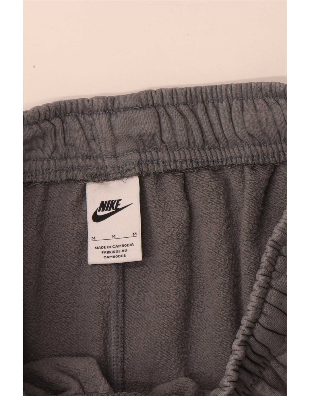 Męskie spodnie dresowe Nike Cargo Joggers, średnioszare, bawełniane