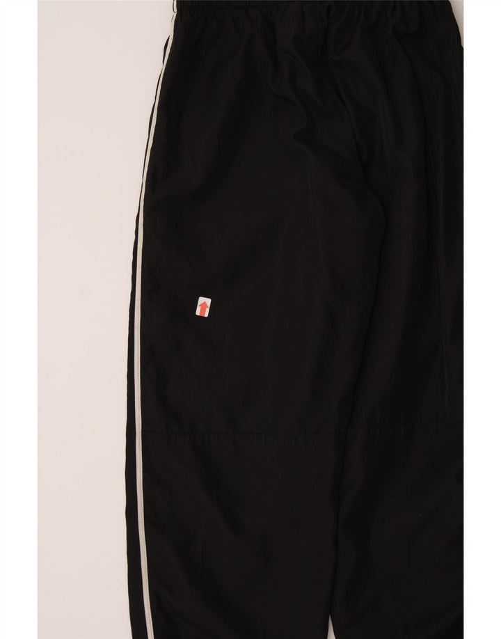 NIKE Boys Tracksuit Trousers Joggers 8-9 Years Small  Black Polyester Vintage Nike and Second-Hand Nike from Messina Hembry 