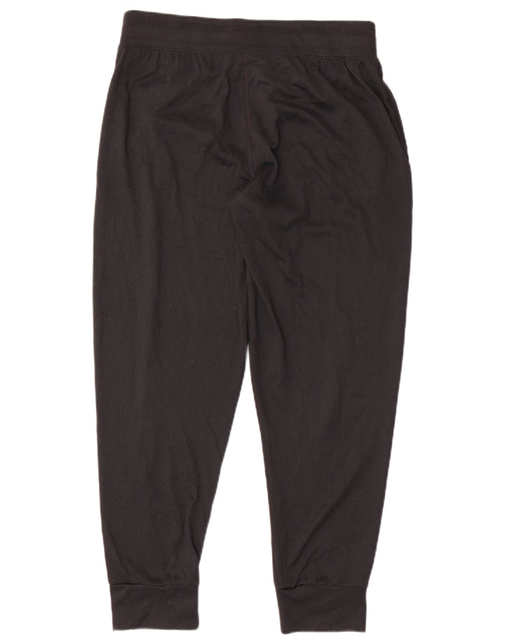 Damskie spodnie dresowe Under Armour Heat Gear w kolorze średniej czerni
