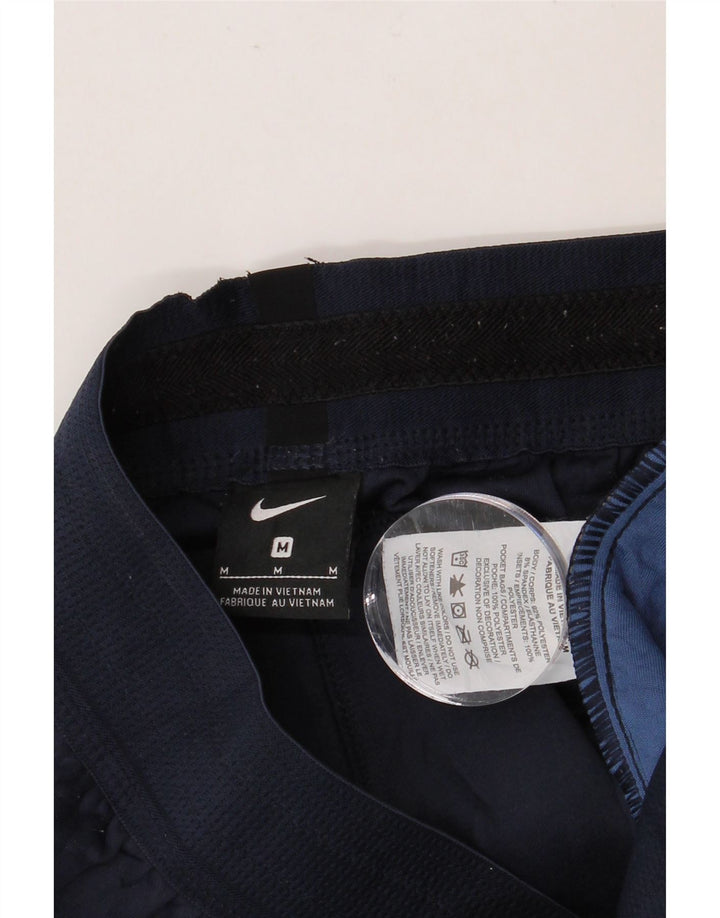 Męskie spodnie dresowe NIKE, średni granatowy poliester