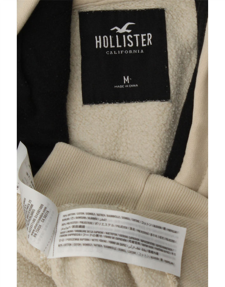 HOLLISTER Męski sweter z kapturem i grafiką, bawełniany, w kolorze średniego beżu