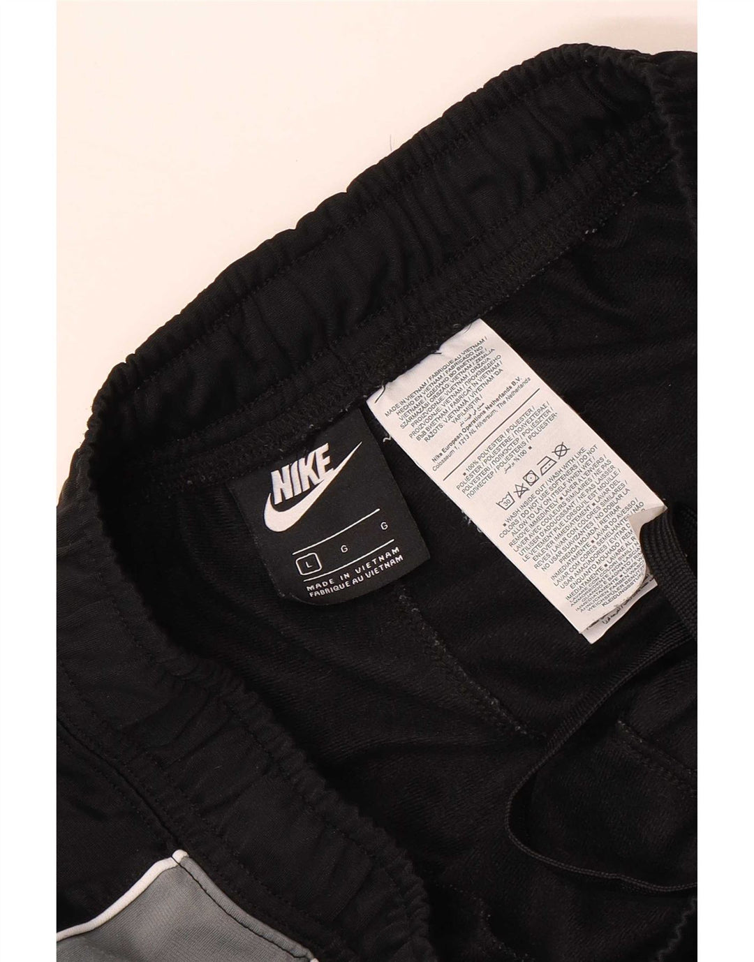 Męskie spodnie dresowe Nike Joggery, duży czarny poliester z blokami kolorów