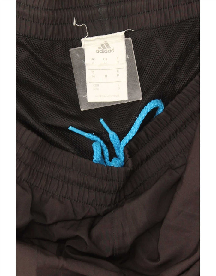 Męskie spodnie dresowe Adidas, średnio czarne, z blokami kolorów