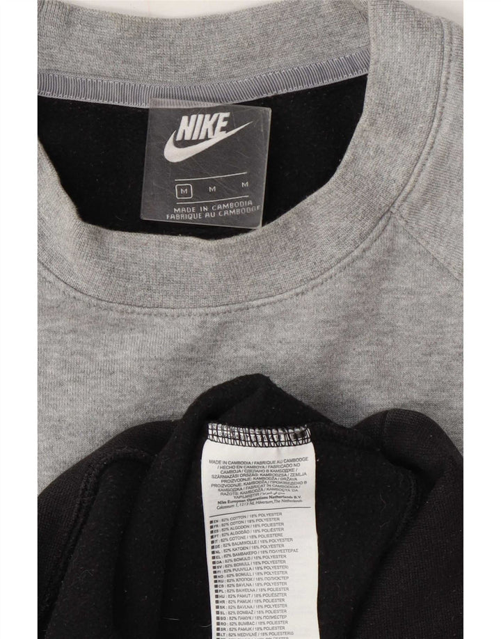 Męska bluza z grafiką Nike, bawełniana, średnia czarna, z blokami kolorów