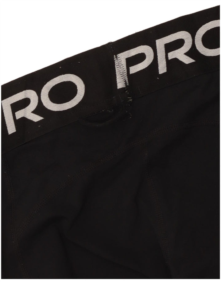 Damskie legginsy Nike Graphic UK 8, małe, czarne, poliestrowe