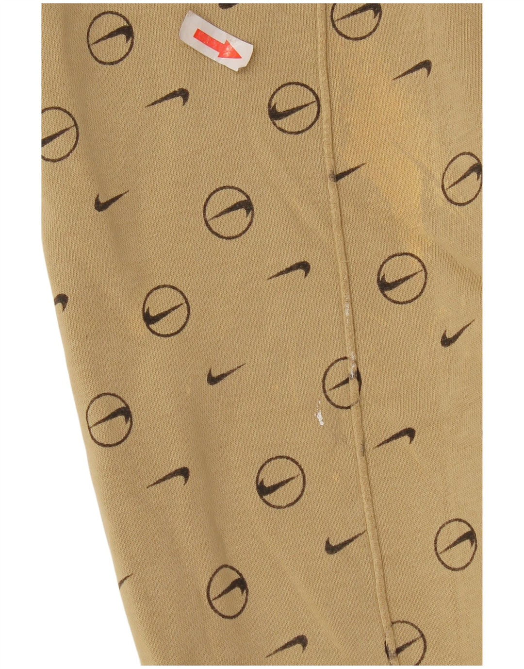 Męskie spodnie dresowe Nike z grafiką, małe, beżowe, geometryczne