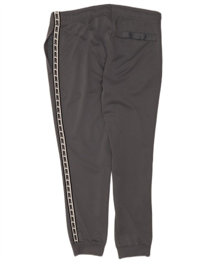 Męskie spodnie dresowe Nike Graphic Dresy Joggery w kolorze średnioszarym