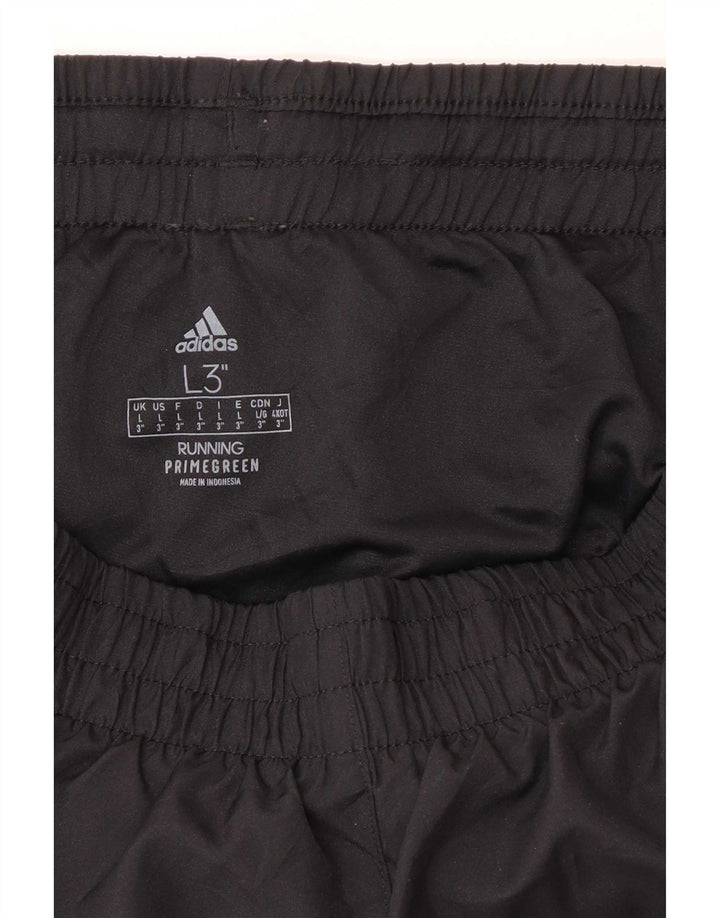 Damskie spodenki sportowe Adidas duże W32 L3 czarny poliester