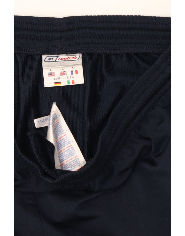 REEBOK Mens Tracksuit Trousers Large Navy Blue Colourblock Polyester Vintage Reebok and Second-Hand Reebok from Messina Hembry 