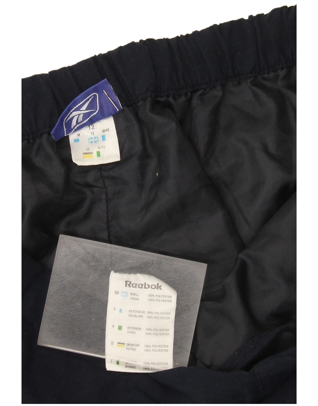 Damskie spodnie dresowe Reebok Capri UK 12 Średni granatowy poliester