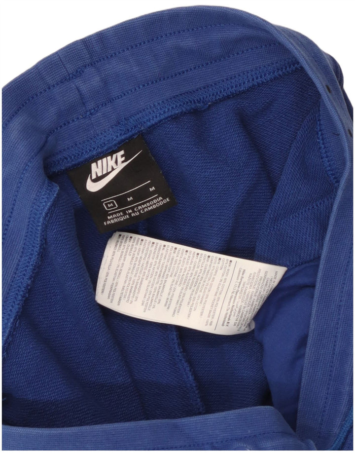 Męskie spodnie dresowe Nike Graphic Dresy Joggery w kolorze średnioniebieskim