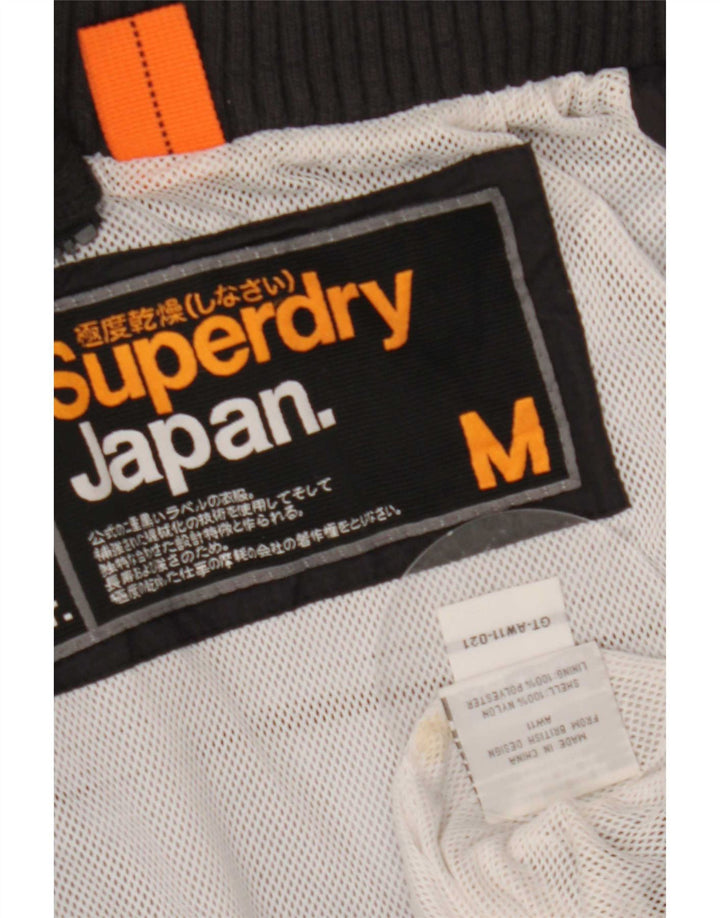 Damska kurtka przeciwdeszczowa Superdry Graphic UK 12, średni czarny nylon