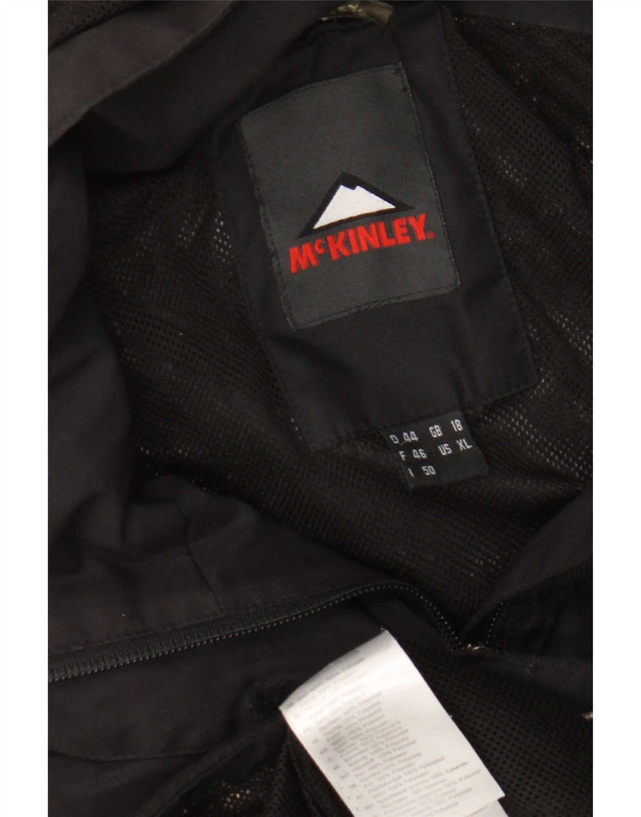 Damska kurtka wiatrówka MC Kinley z kapturem UK 18 XL, czarna, poliamidowa
