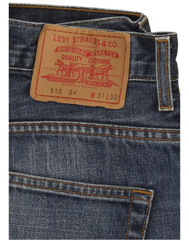 Damskie jeansy Levi's 516 Flared W31 L32 Niebieskie bawełniane