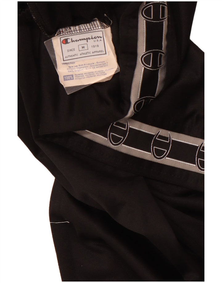 Damskie spodnie dresowe CHAMPION z grafiką UK 12, średni czarny poliester