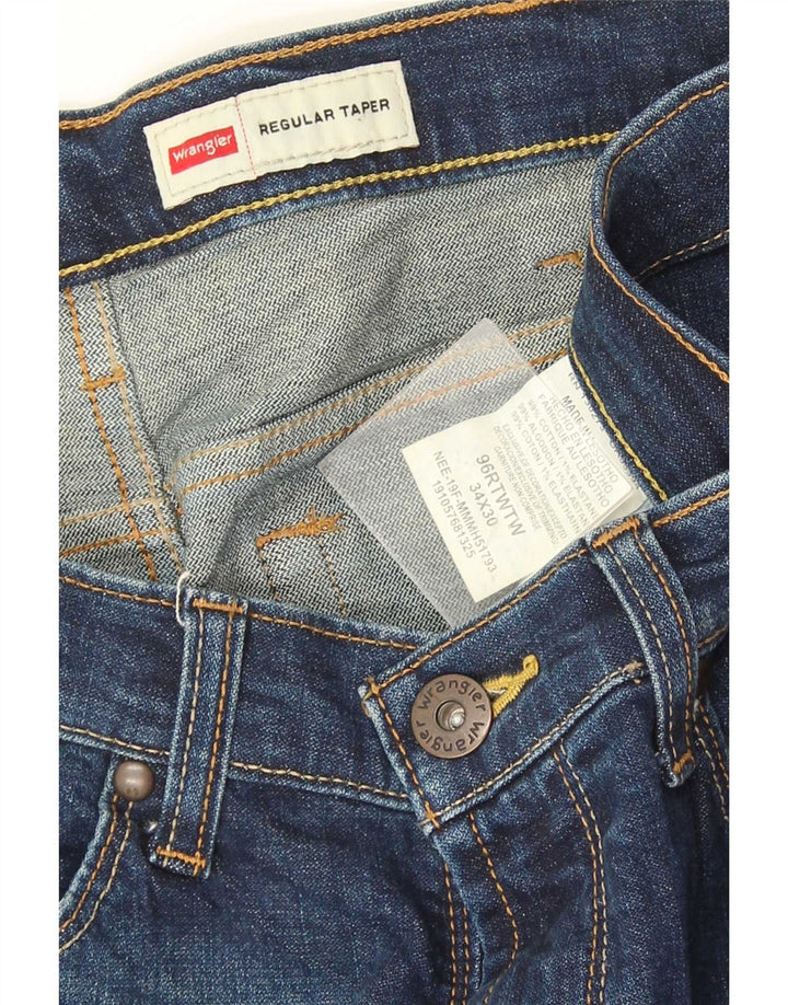 Męskie jeansy Wrangler Regular Tapered W34 L30 Granatowa bawełna