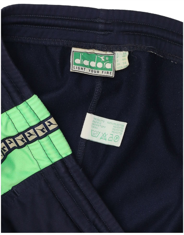 Męskie spodenki sportowe Diadora z grafiką, duże, granatowe, z blokami kolorów, z poliestru