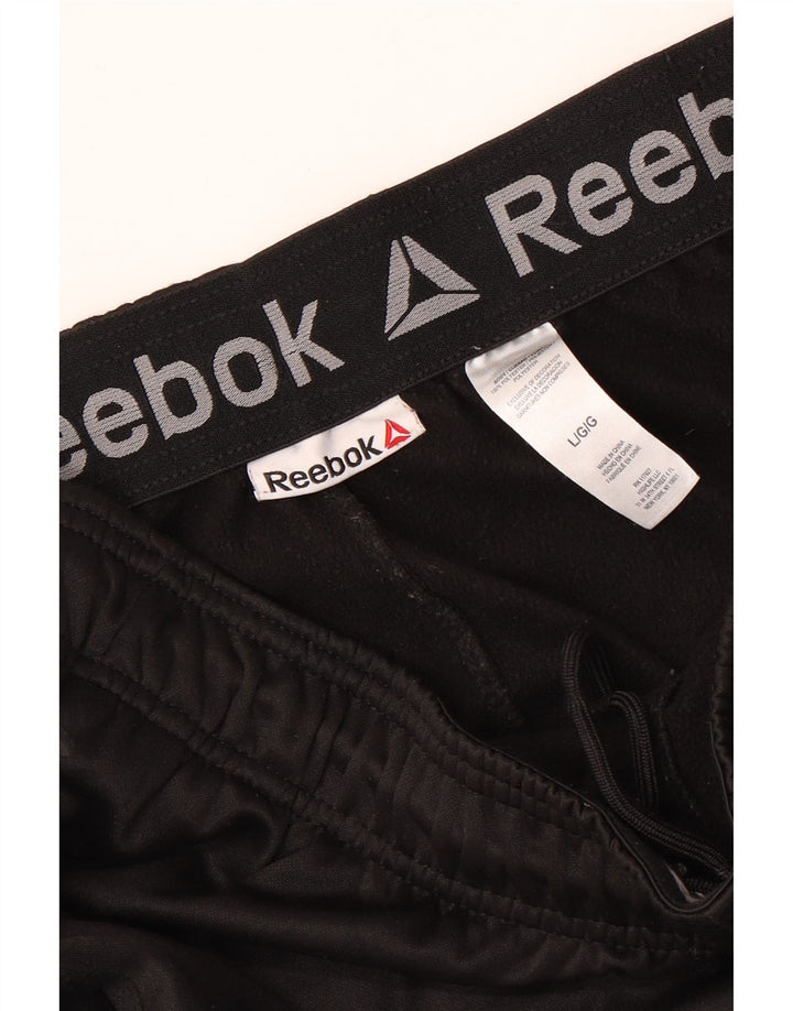 Męskie spodnie dresowe REEBOK, duże, czarne, poliestrowe