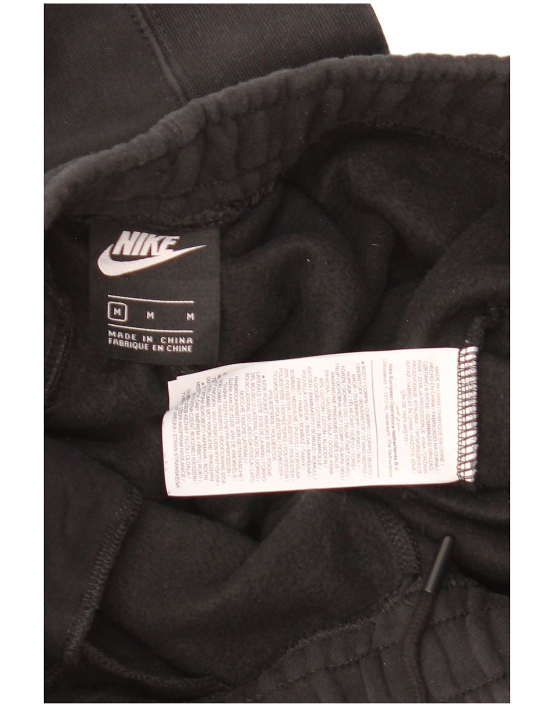 Męskie spodnie dresowe Nike Graphic Joggers, średnia czarna bawełna