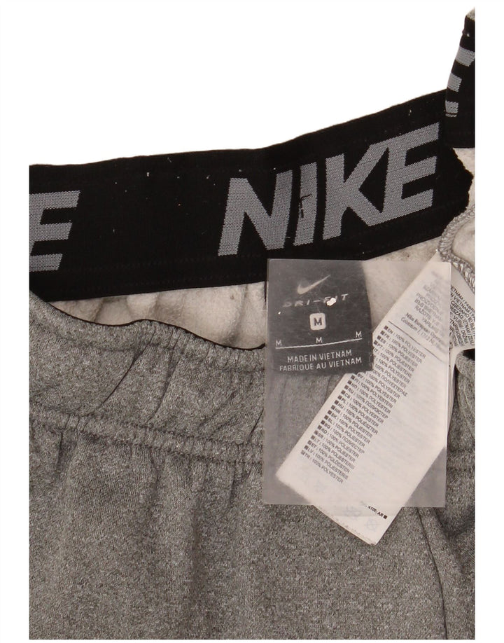 Męskie spodnie dresowe Nike Dri Fit Joggery w kolorze średnioszarym, z poliestru w cętki