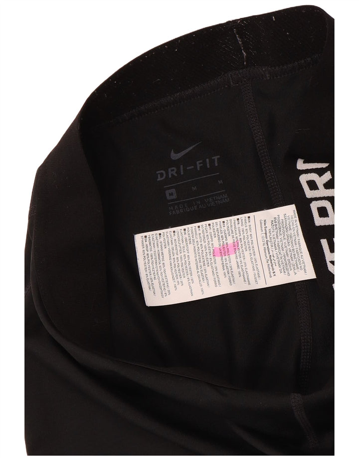 Damskie legginsy Nike Dri Fit Graphic Capri UK 12, średni czarny poliester