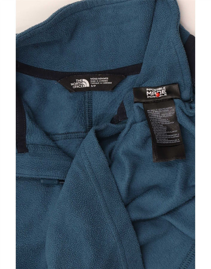 Męski sweter polarowy The North Face z zamkiem błyskawicznym i małym niebieskim poliestrem w blokach kolorów