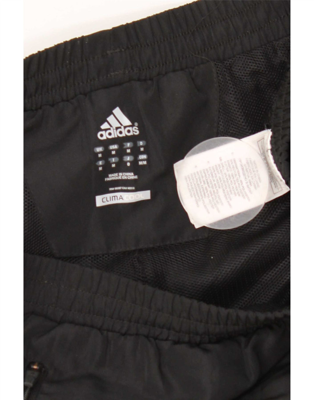 Męskie spodnie dresowe Adidas Climacool, średni czarny poliester z blokami kolorów