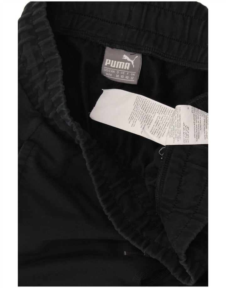 Damskie spodnie dresowe PUMA Joggers UK 12 Średni granatowy, bawełniany