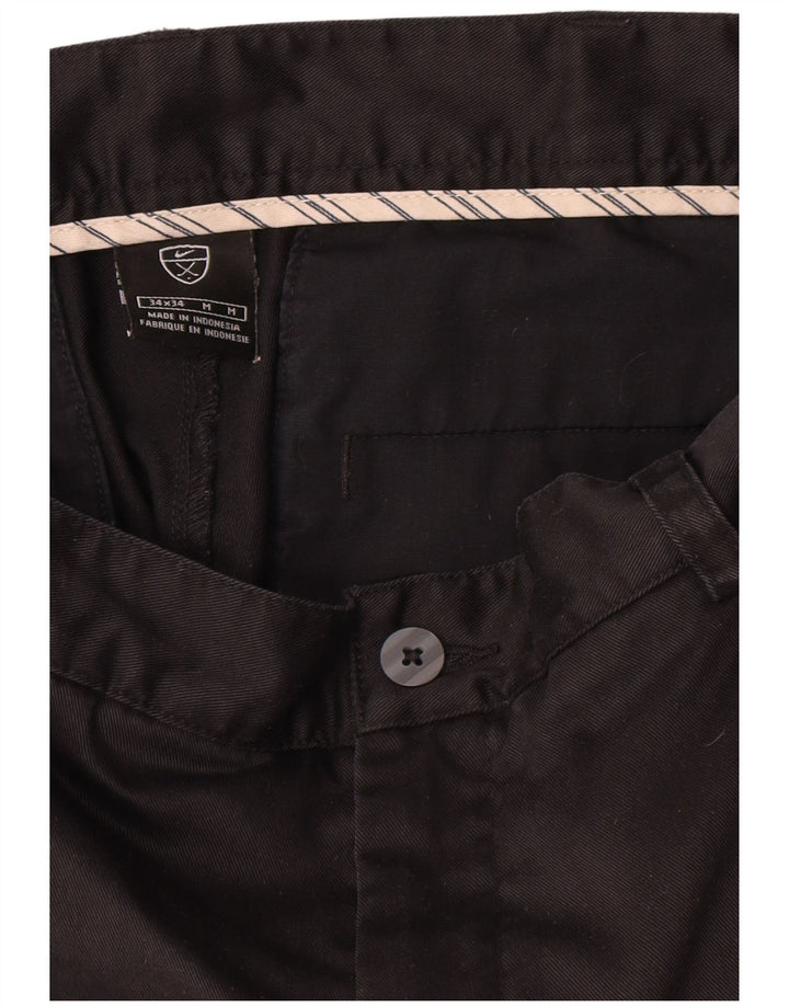 Męskie spodnie chino Nike Pegged W34 L34 granatowe