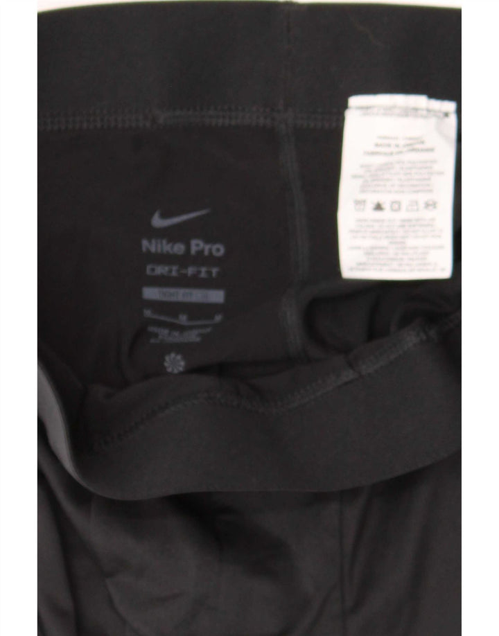 Damskie legginsy Nike Tight Fit UK 12, średni czarny poliester