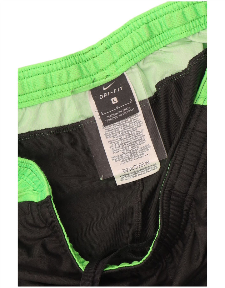 Męskie spodnie dresowe Nike Dri Fit, duży szary poliester z blokami kolorów