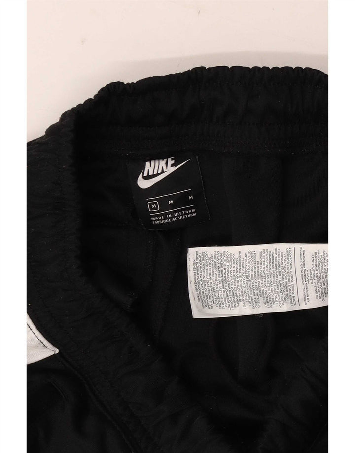 Męskie spodnie dresowe Nike Dri Fit, poliester w kolorze średniej czarnej kolorystyki