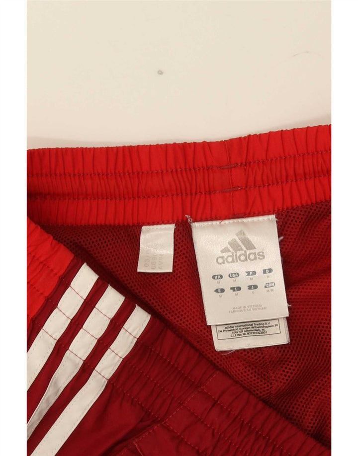Adidas Męskie spodnie dresowe Joggery Średni czerwony poliester
